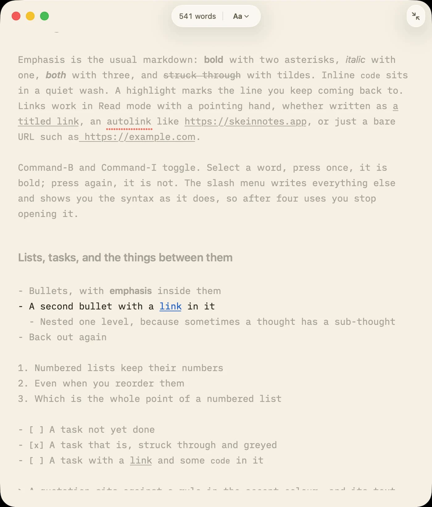 Lede in Focus view: the line being written in full ink and everything else dimmed to the page's own grey, with the toolbar reduced to a word count and a font menu and the status bar cleared away